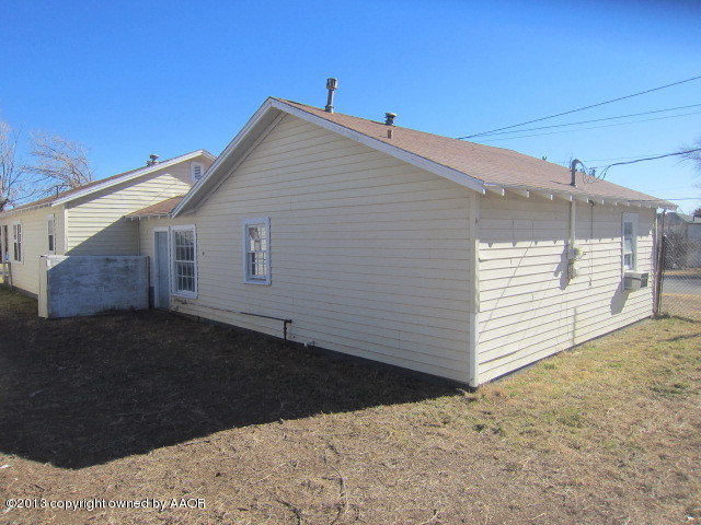 4130 South Tyler Street Amarillo, TX 79110 - Photo 8 of 15 a view of a house with a yard