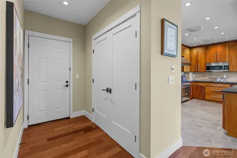 a view of a kitchen from the hallway