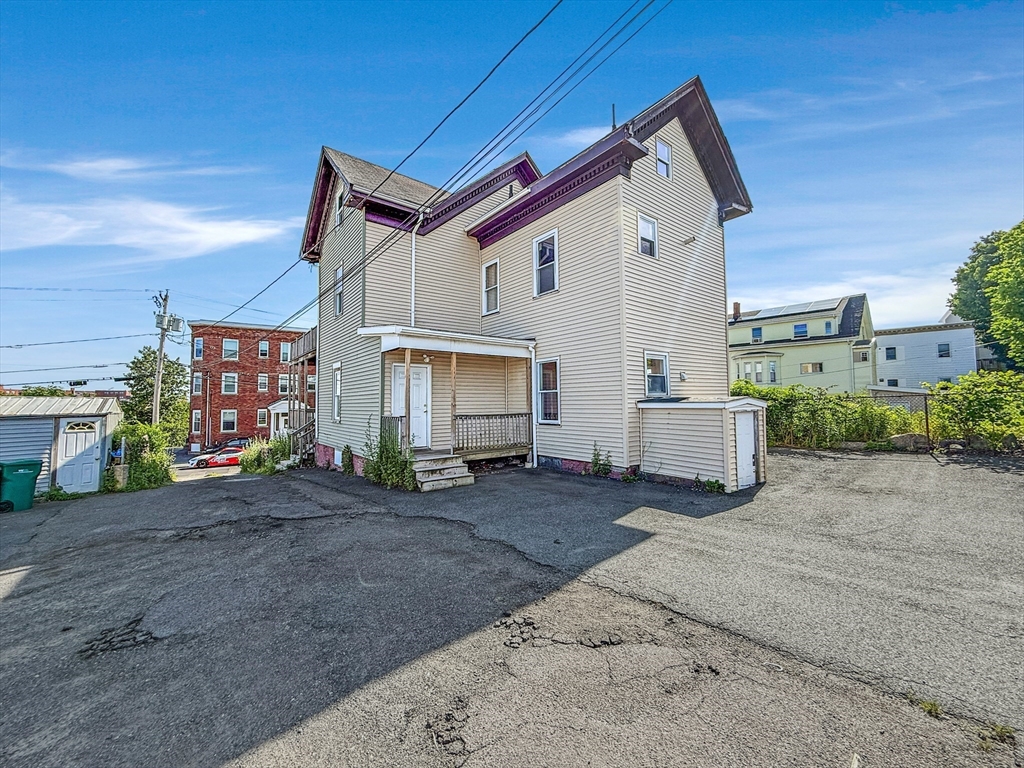 19 High Street Lynn, MA 01902 - Photo 2 of 42 a view of a house with a patio