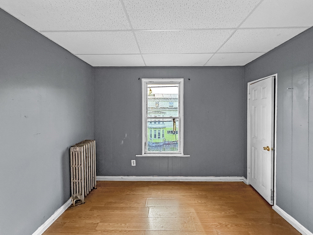 19 High Street Lynn, MA 01902 - Photo 28 of 42 a view of an empty room with a window