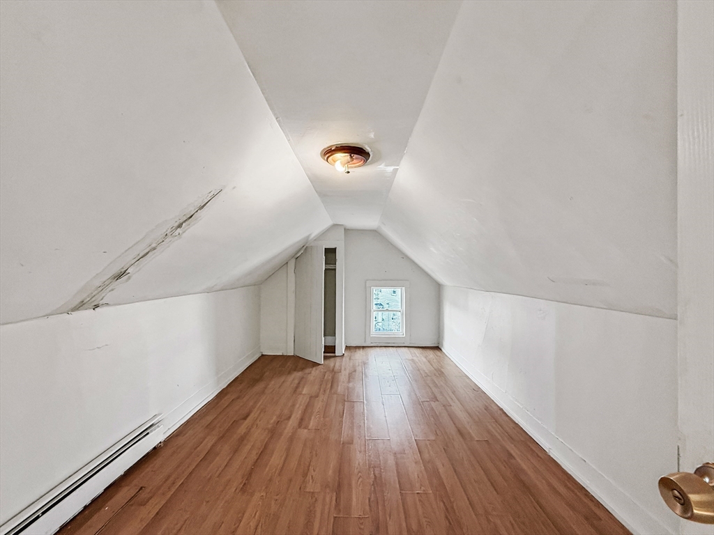 19 High Street Lynn, MA 01902 - Photo 31 of 42 a view of livingroom with furniture and wooden floor