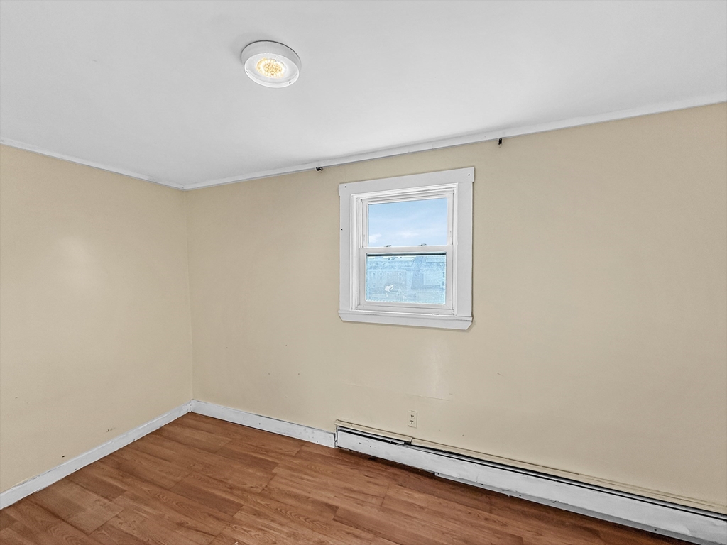 19 High Street Lynn, MA 01902 - Photo 33 of 42 a view of a room with wooden floor