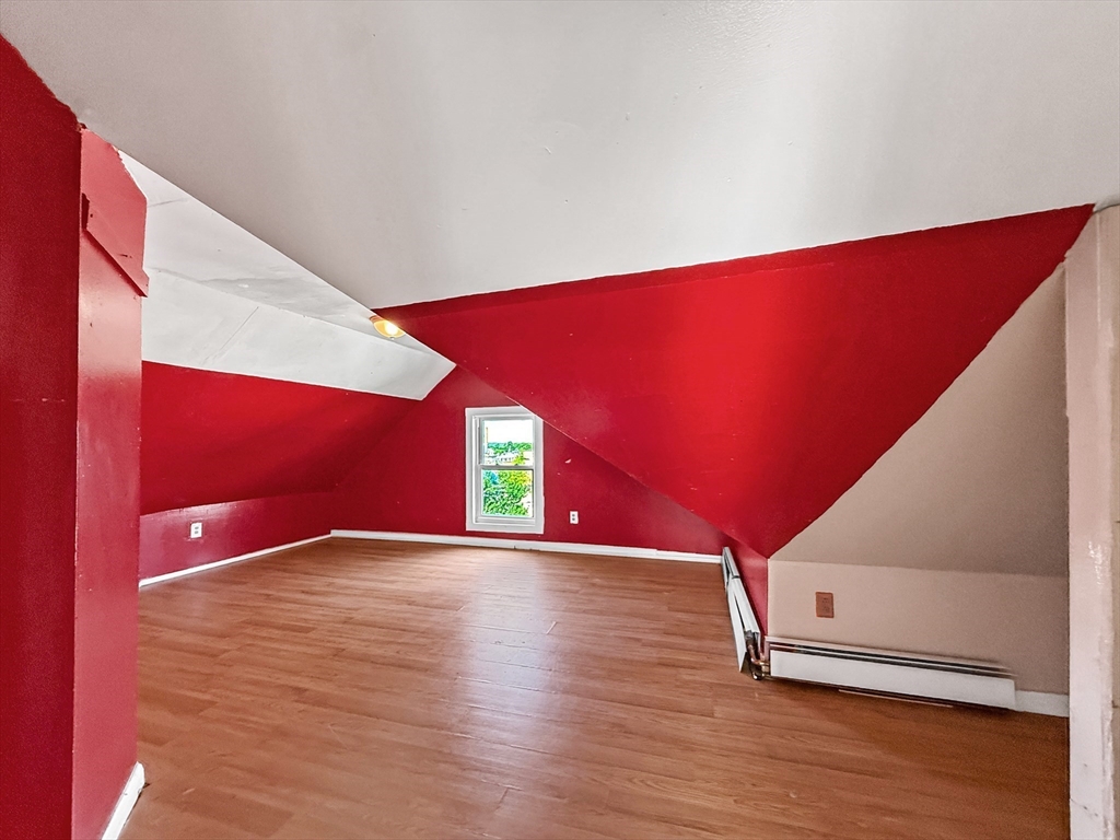 19 High Street Lynn, MA 01902 - Photo 37 of 42 a view of an empty room with wooden floor