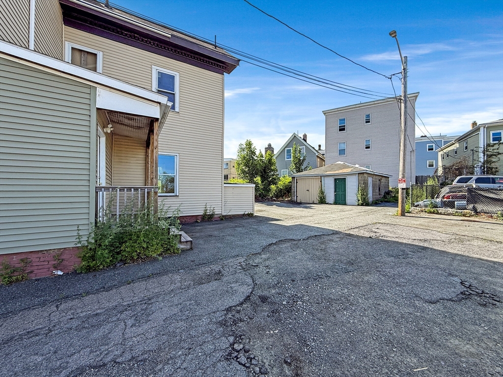 19 High Street Lynn, MA 01902 - Photo 39 of 42 a house with a yard