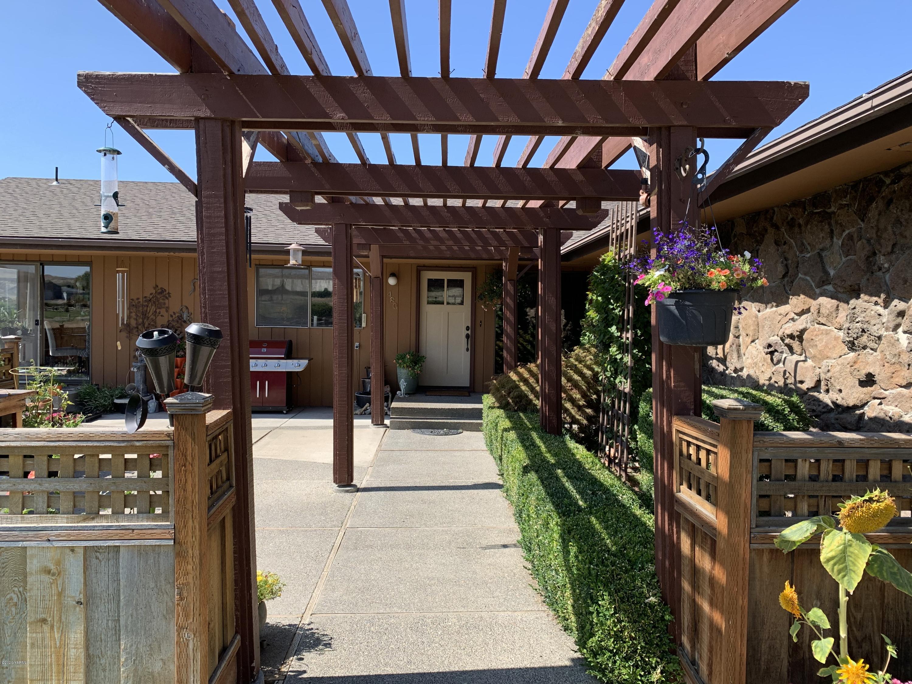 a view of a chairs and tables in patio