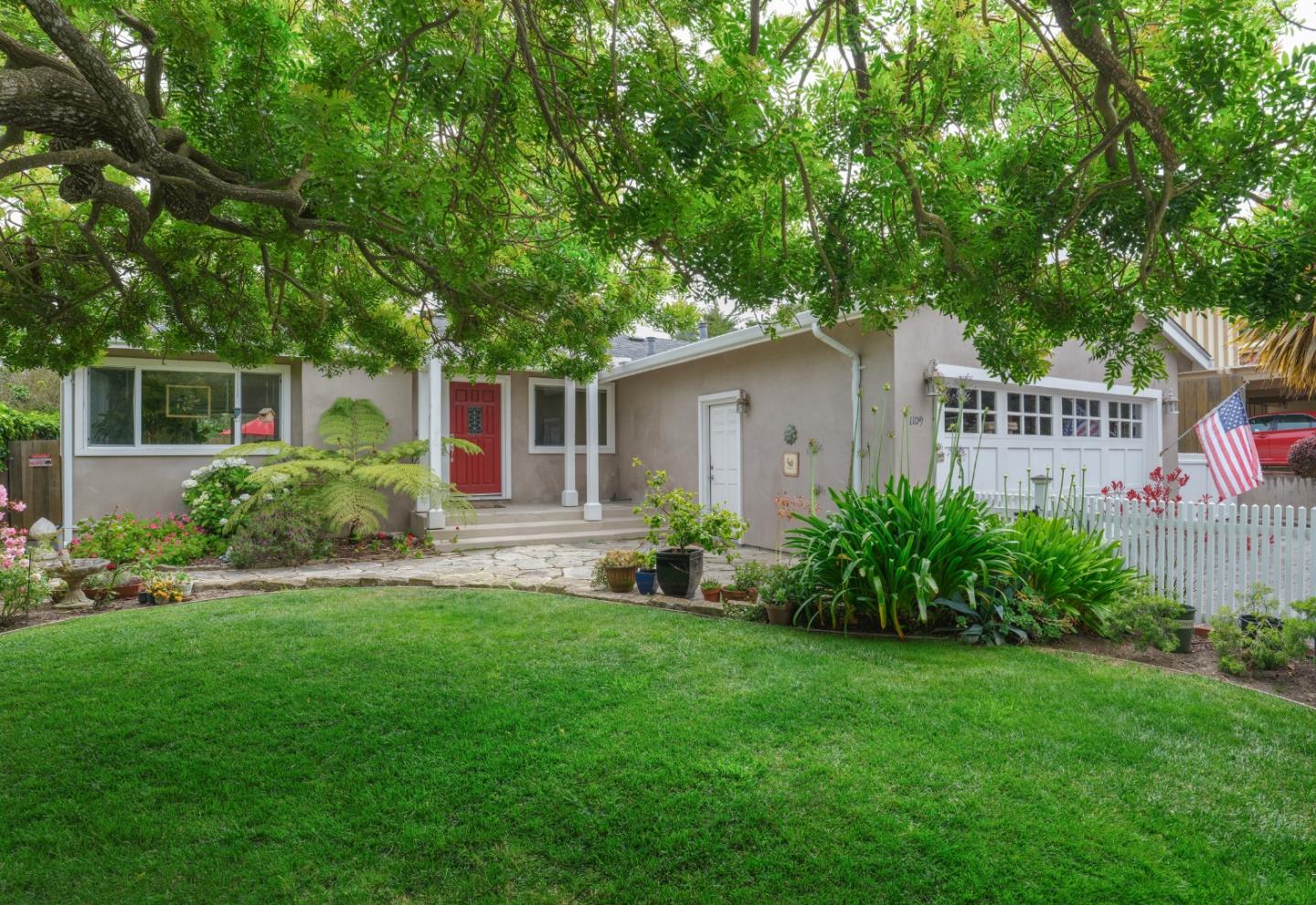 a house view with a garden space