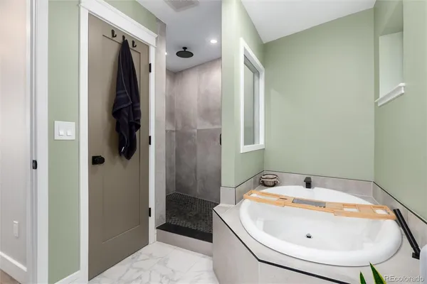 a bathroom with a sink and shower