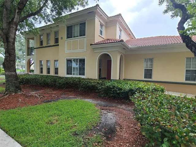 a view of outdoor space yard and front view of a house