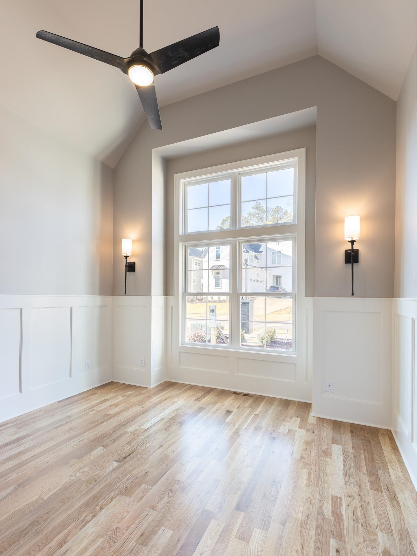 6312 Stephens Ridge Raleigh, NC 27615 - Photo 19 of 28 a view of an empty room with wooden floor and a window