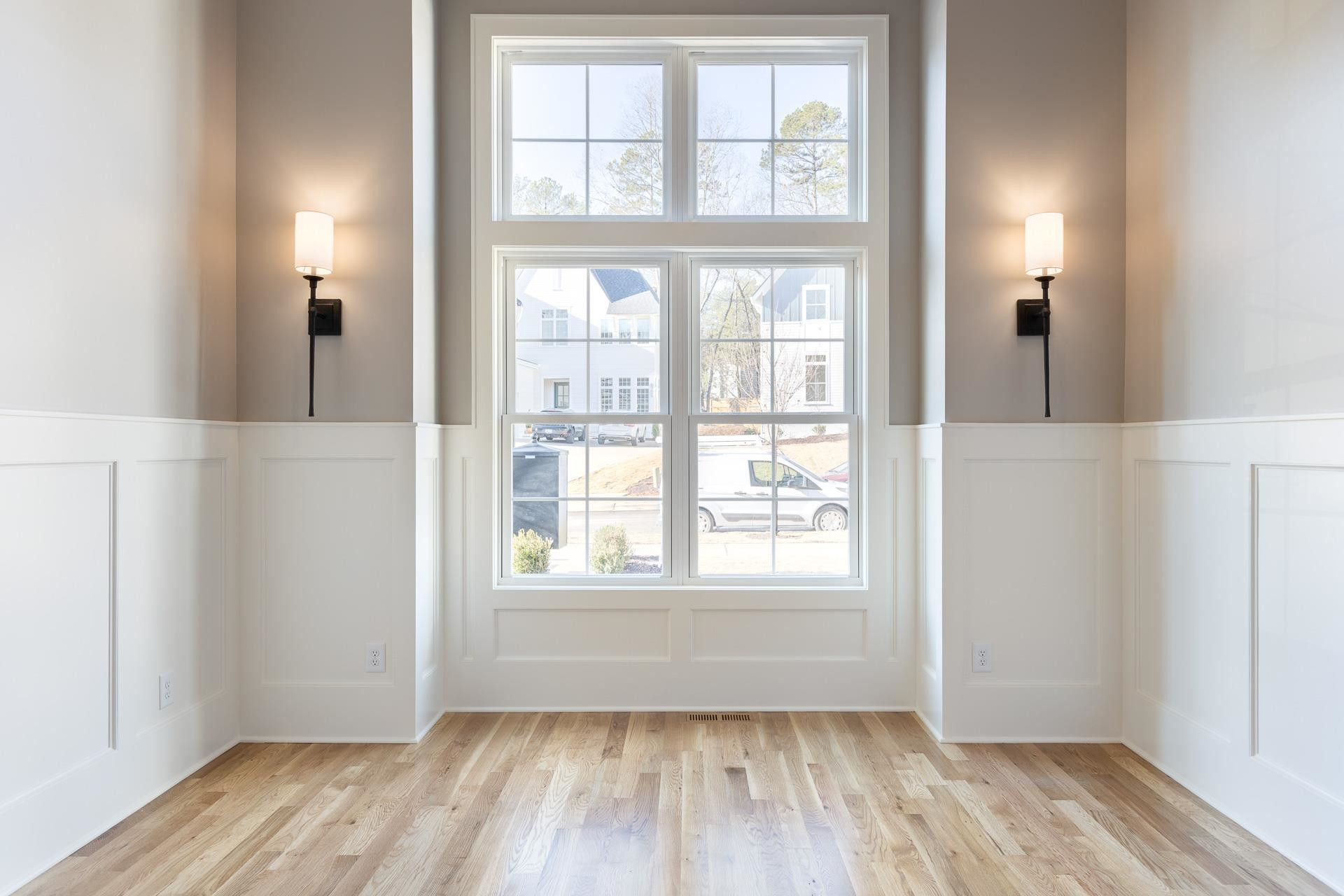 6312 Stephens Ridge Raleigh, NC 27615 - Photo 20 of 28 an empty room with wooden floor and windows