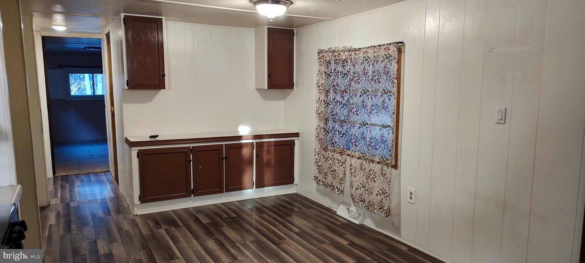 2633 Old Trail Road Liverpool, PA 17045 - Photo 3 of 32 a view of a hallway with wooden floor and staircase