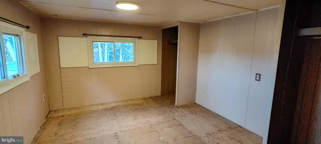 an empty room with windows