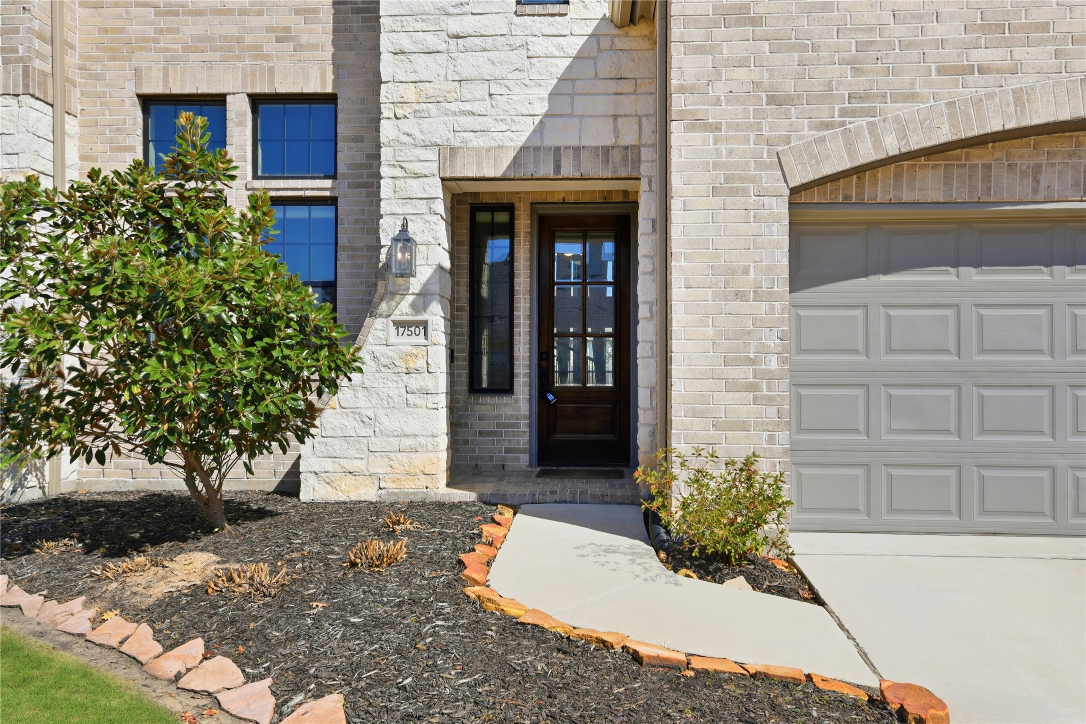 17501 Spice Merlot Lane Conroe, TX 77302 - Photo 6 of 50 a front view of a house with a yard