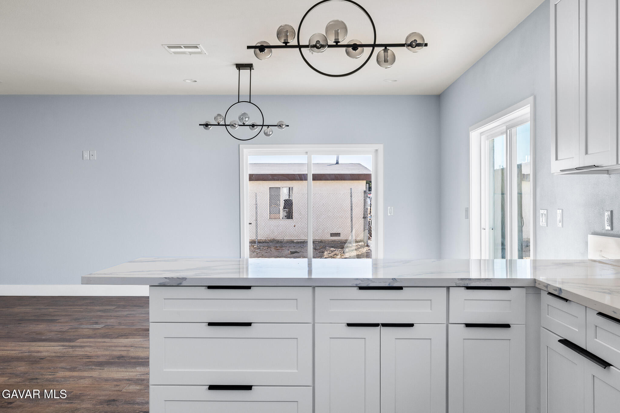 10708 East Ave R 14 Littlerock, CA 93543 - Photo 14 of 38 a kitchen with a window and a sink