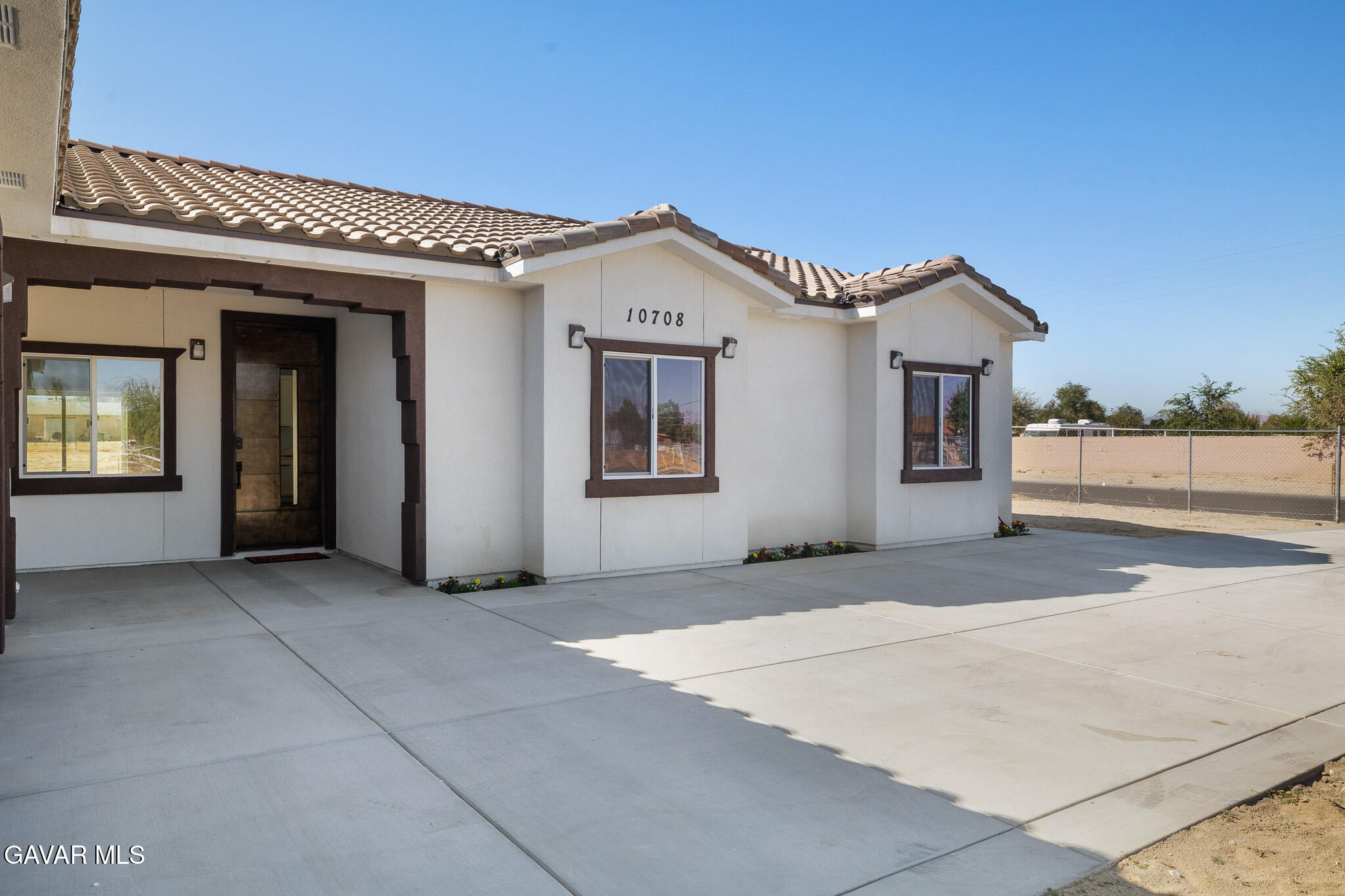 10708 East Ave R 14 Littlerock, CA 93543 - Photo 3 of 38 a view of a house with a backyard