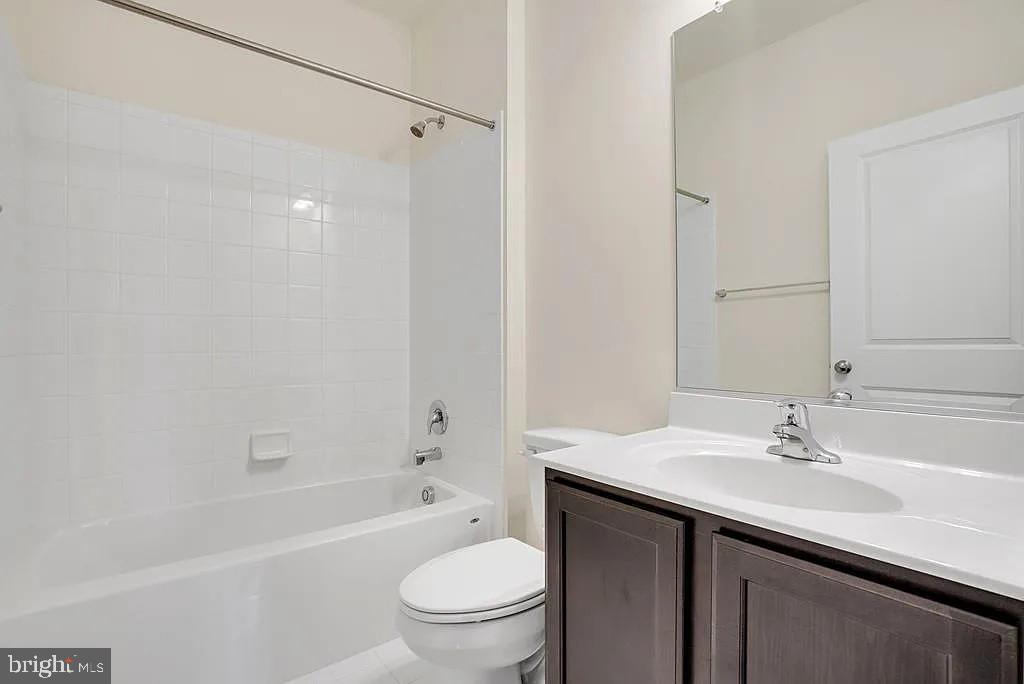 Tbd Tbd Harrier Way Waynesboro, PA 17268 - Photo 10 of 14 a bathroom with a sink a toilet a mirror a bathtub and shower