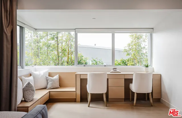 a bathroom with a bathtub and a window