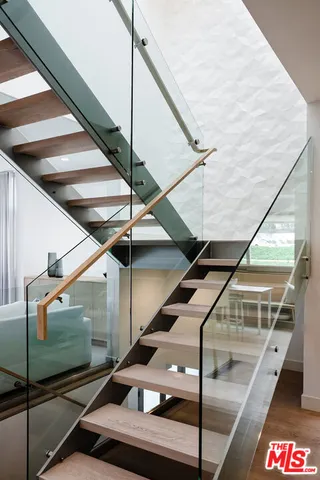 a dining room with furniture window and outside view