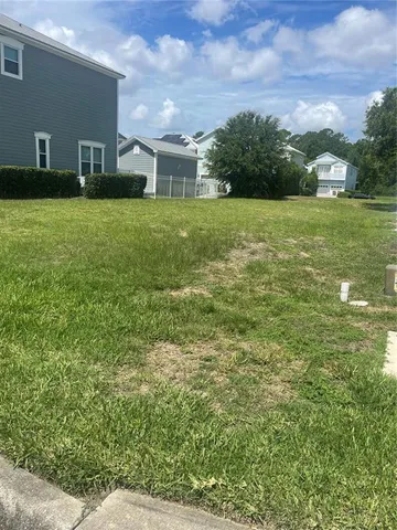 a view of a patio with a yard