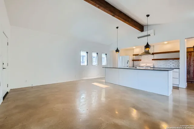 a view of a kitchen with a sink