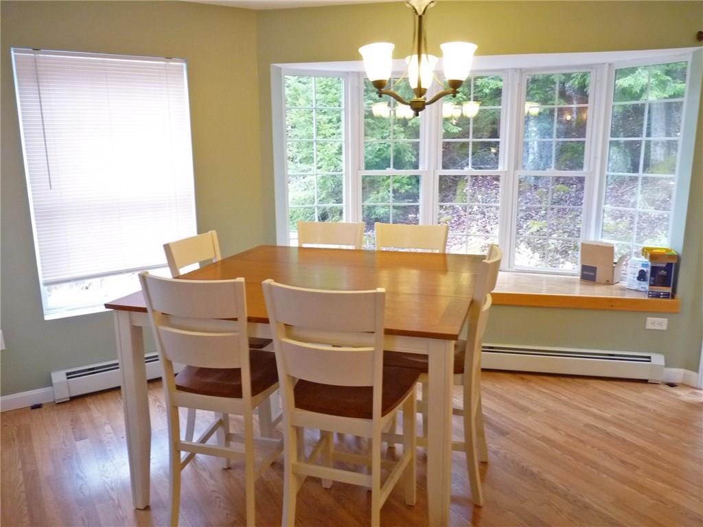 283 Lily Road Dedham, ME 04429 - Photo 6 of 22 Nice dining area with view of back yard.
