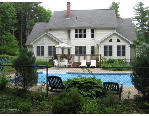 15 Elliott Road Sterling, MA 01564 - Photo 1 of 15 a front view of a house with garden
