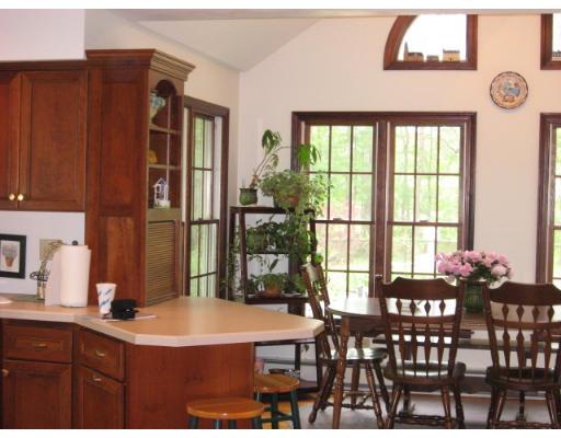 15 Elliott Road Sterling, MA 01564 - Photo 5 of 15 a kitchen with a table chairs and window