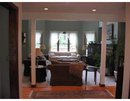 15 Elliott Road Sterling, MA 01564 - Photo 10 of 15 a room with kitchen island granite countertop wooden floor and a view of living room