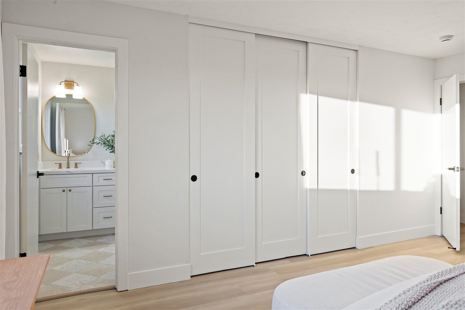 2973 Ralston Way Hayward, CA 94541 - Photo 29 of 55 Bedroom featuring a closet, light wood-style flooring, and ensuite bath