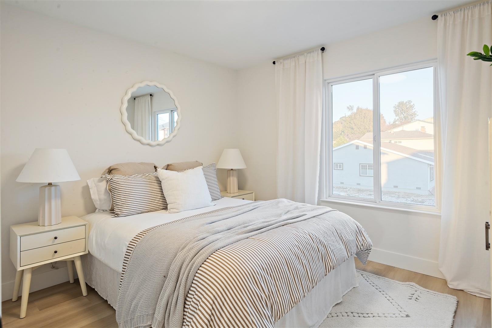 2973 Ralston Way Hayward, CA 94541 - Photo 34 of 55 Bedroom with light wood-style flooring and multiple windows