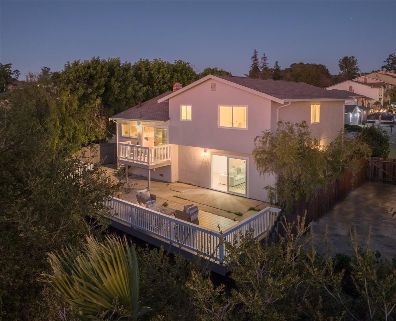 2973 Ralston Way Hayward, CA 94541 - Photo 47 of 55 Rear view of house featuring a patio area, stucco siding, a balcony, a wooden deck, and a chimney