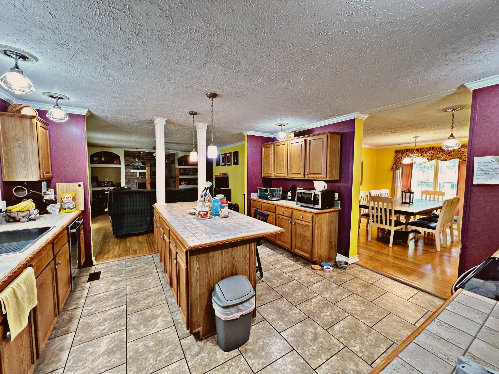 4027 Forrest Hill Road Bolivar, TN 38008 - Photo 12 of 32 a kitchen with stainless steel appliances kitchen island granite countertop a sink and cabinets