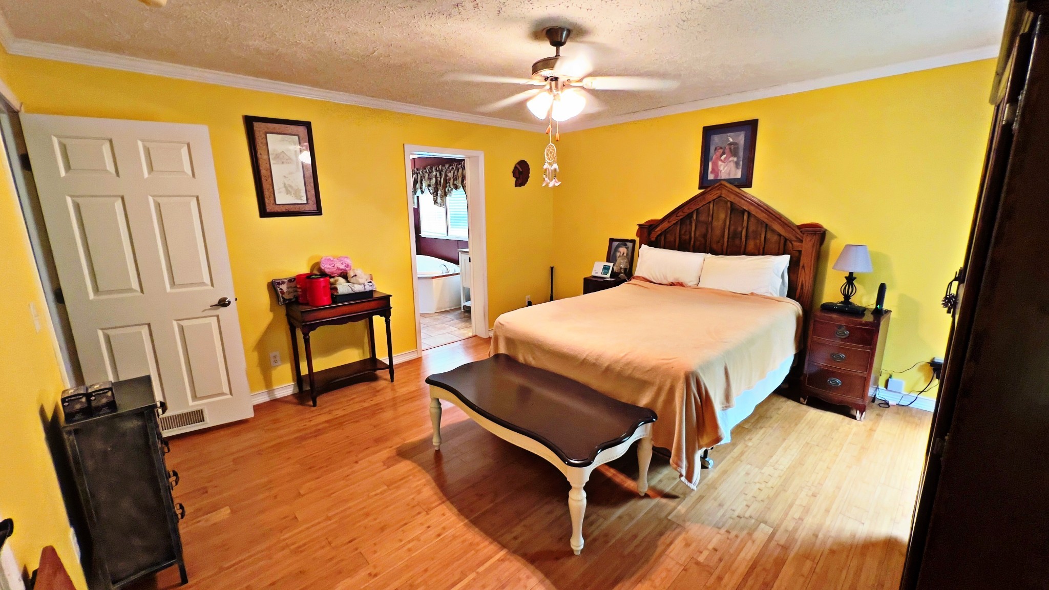 4027 Forrest Hill Road Bolivar, TN 38008 - Photo 14 of 32 a bedroom with a bed and wooden floor