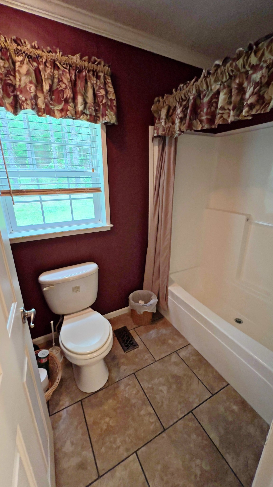 4027 Forrest Hill Road Bolivar, TN 38008 - Photo 24 of 32 a bathroom with a toilet and a shower