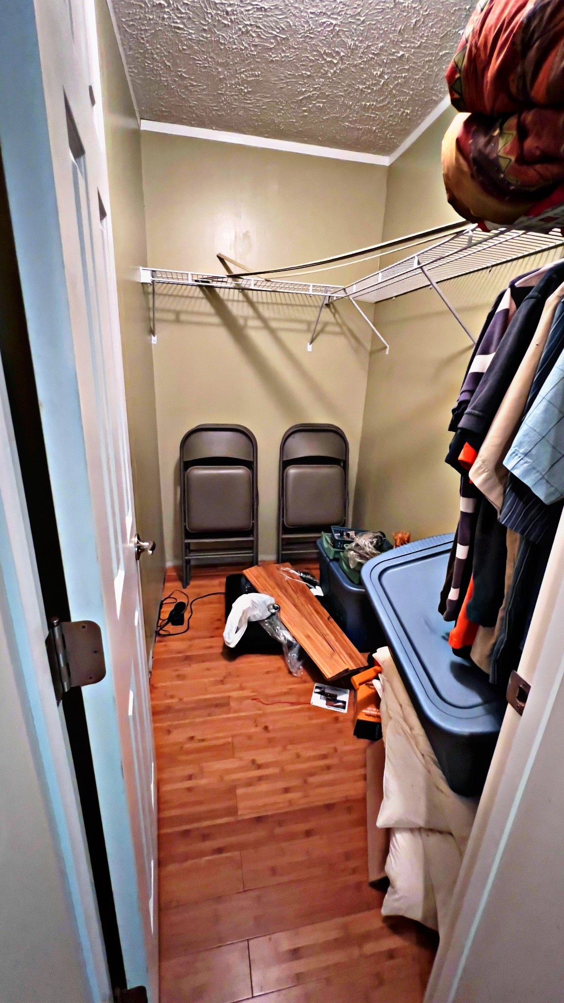 4027 Forrest Hill Road Bolivar, TN 38008 - Photo 25 of 32 a bedroom with a bed and cabinets