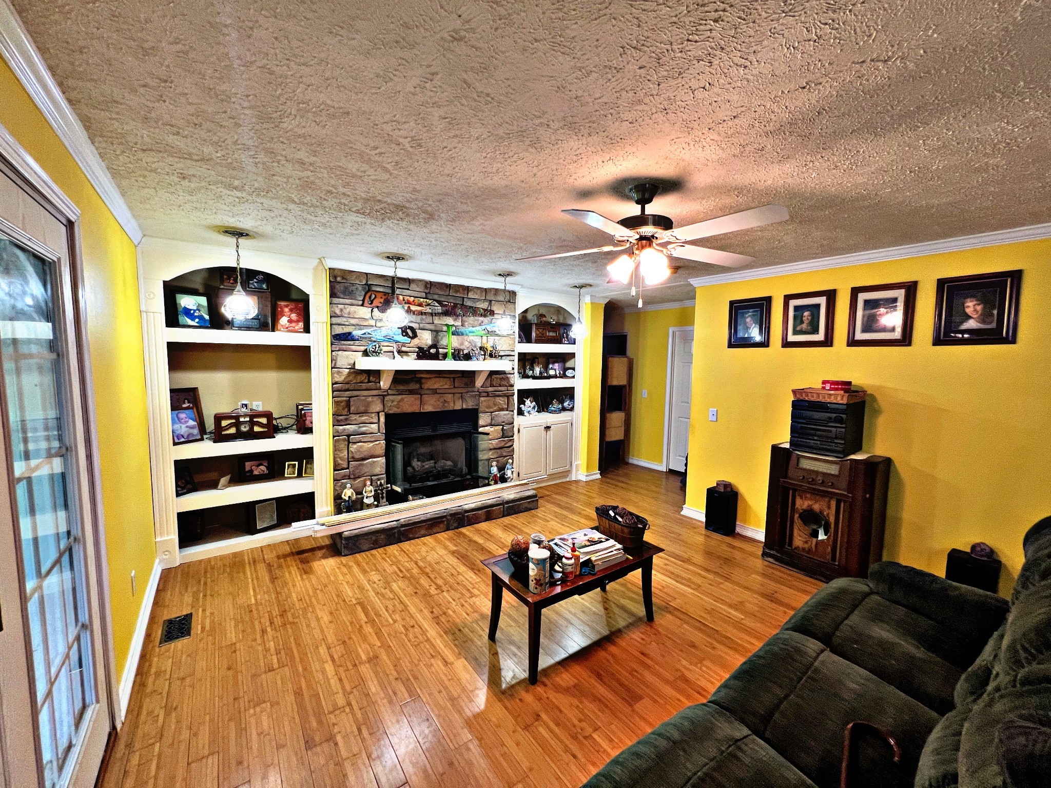 4027 Forrest Hill Road Bolivar, TN 38008 - Photo 10 of 32 a living room with furniture and a flat screen tv