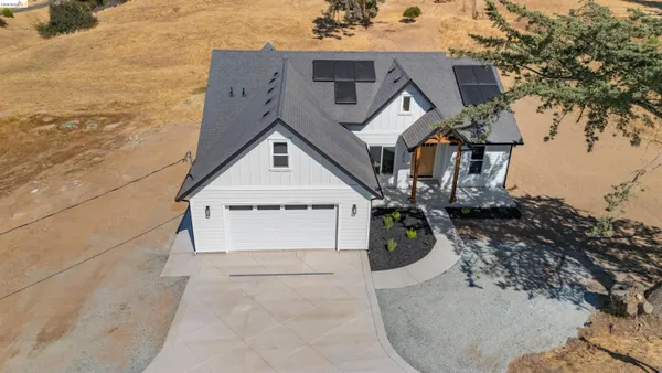 a view of a balcony with an outdoor space