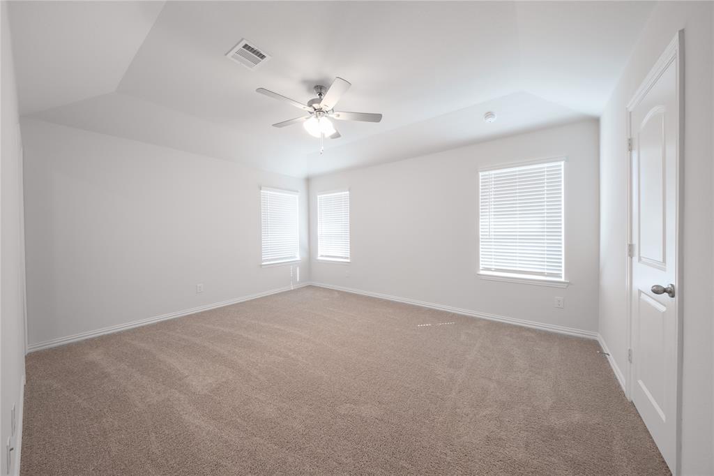 2613 Spade Street Anna, TX 75409 - Photo 11 of 38 a view of an empty room with a window