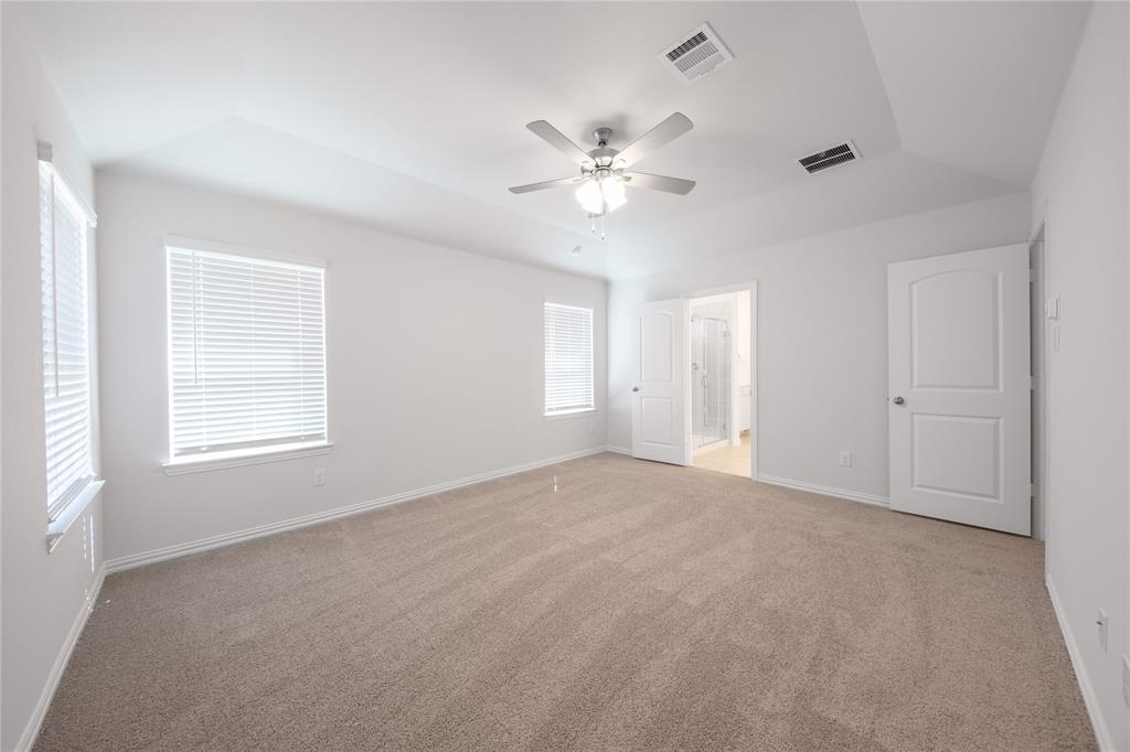 2613 Spade Street Anna, TX 75409 - Photo 12 of 38 a view of an empty room with a window