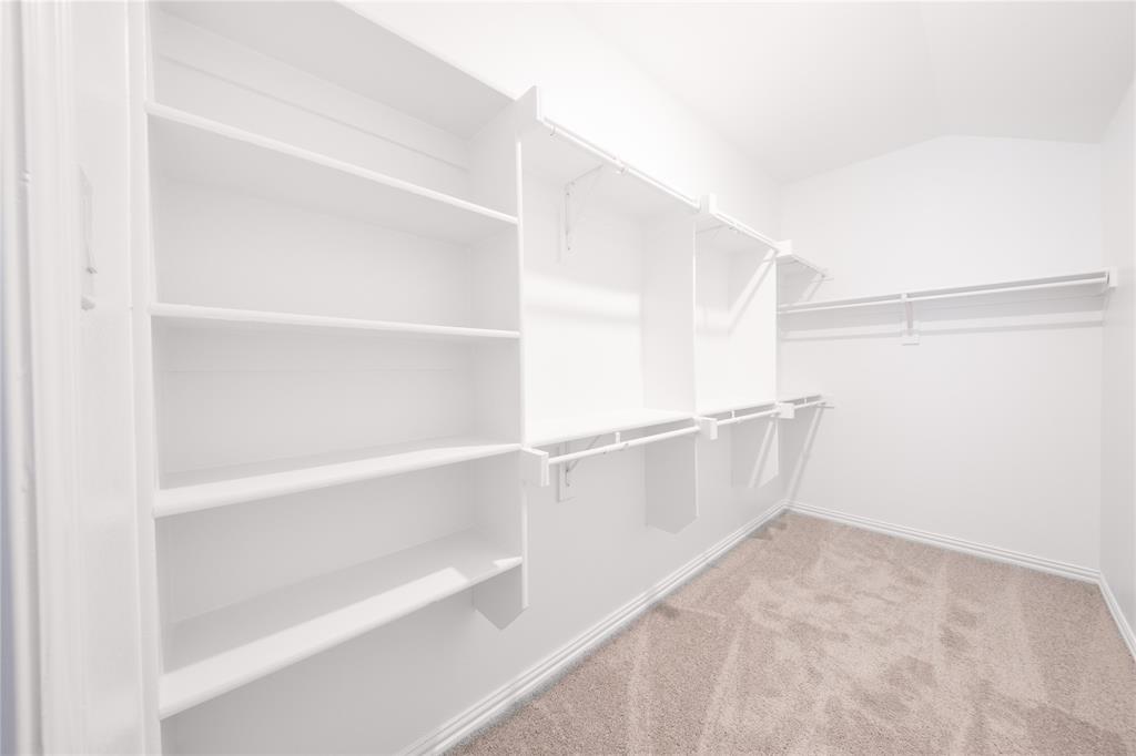 2613 Spade Street Anna, TX 75409 - Photo 16 of 38 a view of an empty walk in closet