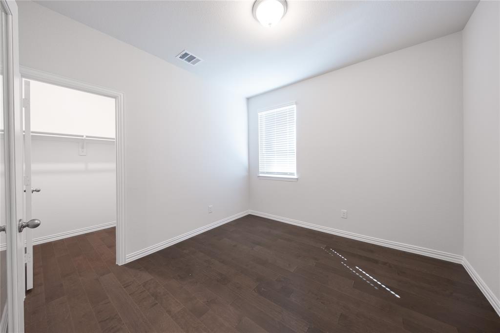 2613 Spade Street Anna, TX 75409 - Photo 17 of 38 an empty room with windows
