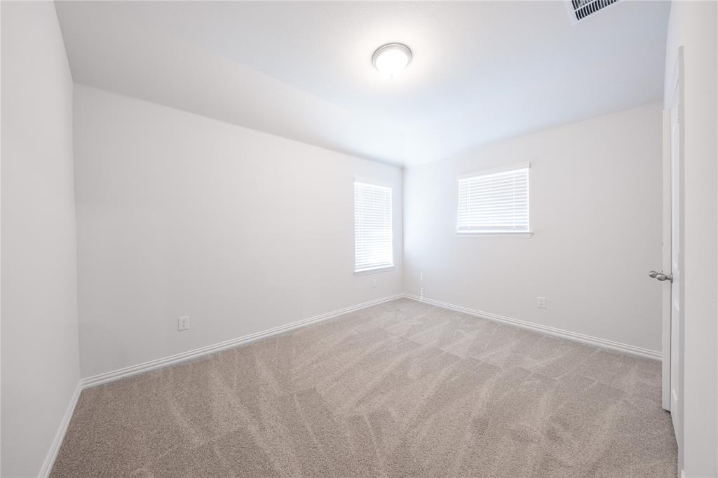 2613 Spade Street Anna, TX 75409 - Photo 24 of 38 a view of an empty room with a window