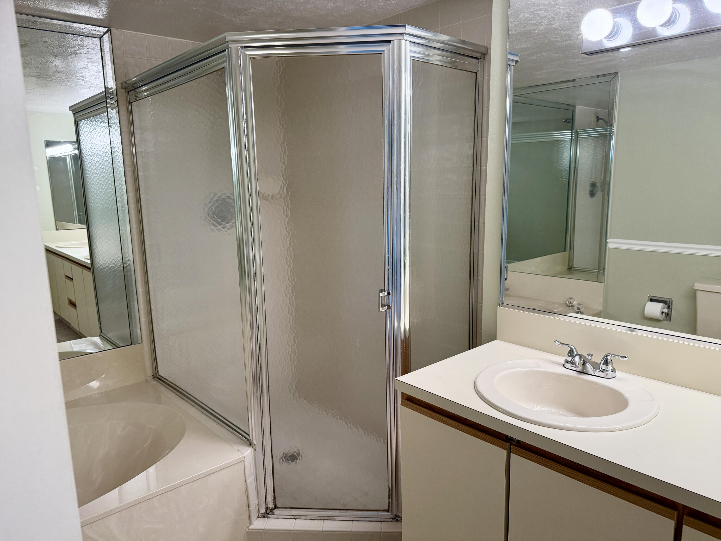 104 Half Moon Circle, Unit B2 Hypoluxo, FL 33462 - Photo 19 of 26 PRIMARY BATHROOM