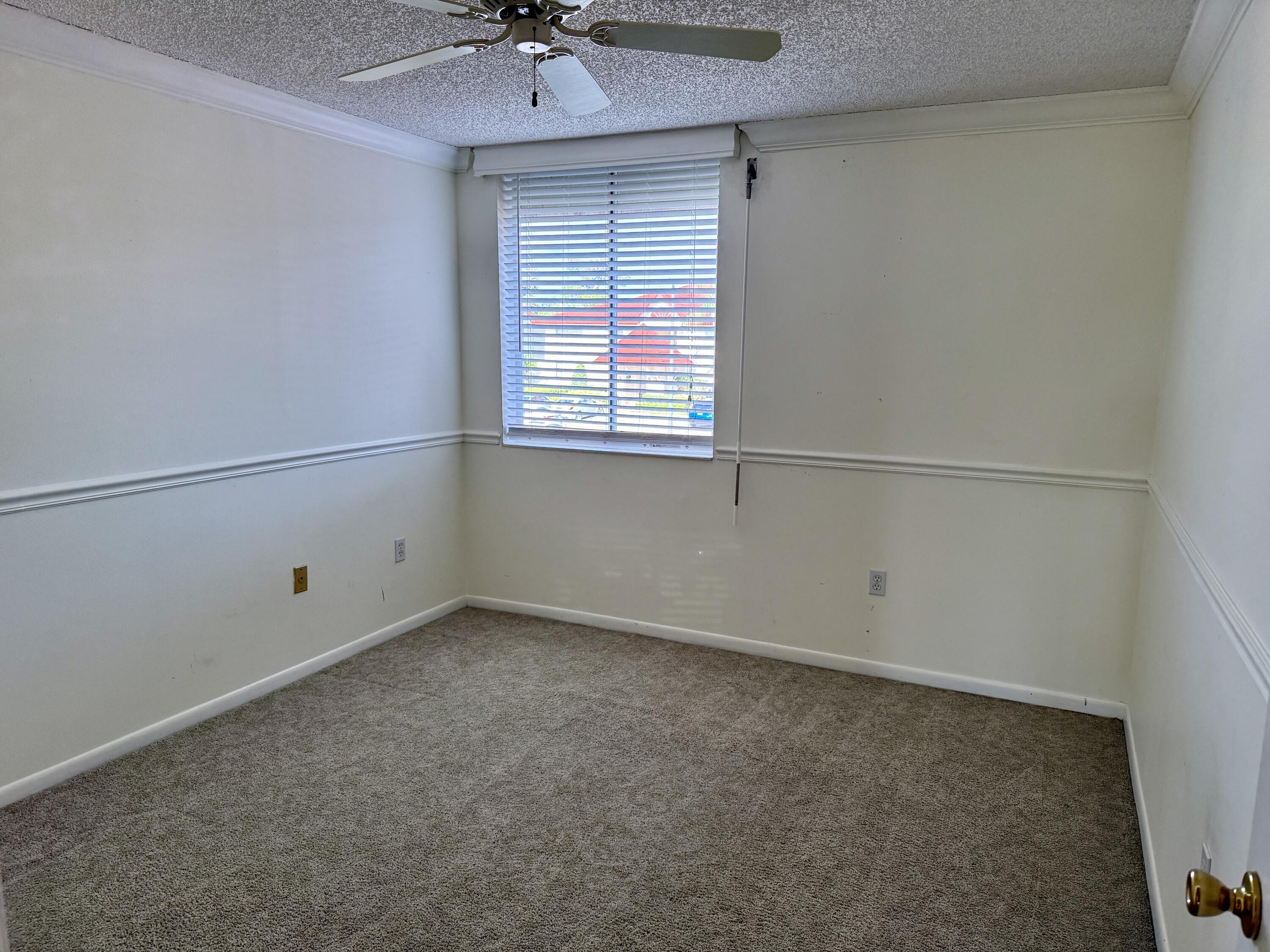 104 Half Moon Circle, Unit B2 Hypoluxo, FL 33462 - Photo 20 of 26 2ND BEDROOM