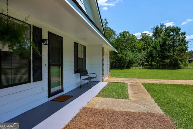 a view of a backyard with a garden