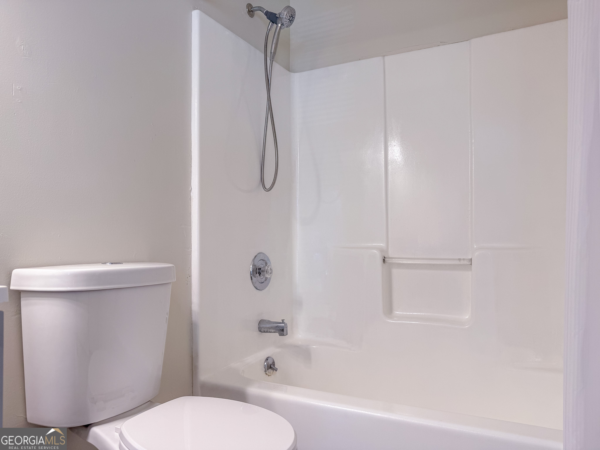 540 Veneys Mill Pond Road Parrott, GA 39877 - Photo 10 of 21 a white toilet sitting next to a bath tub