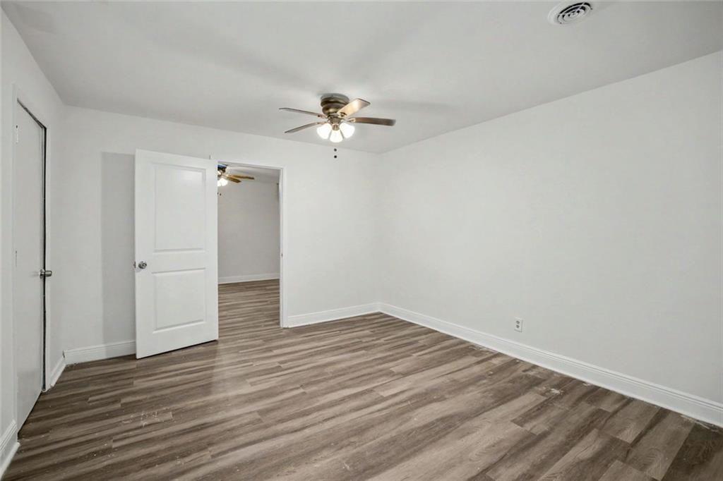 1605 Shackelford Road Griffin, GA 30224 - Photo 30 of 51 wooden floor in an empty room