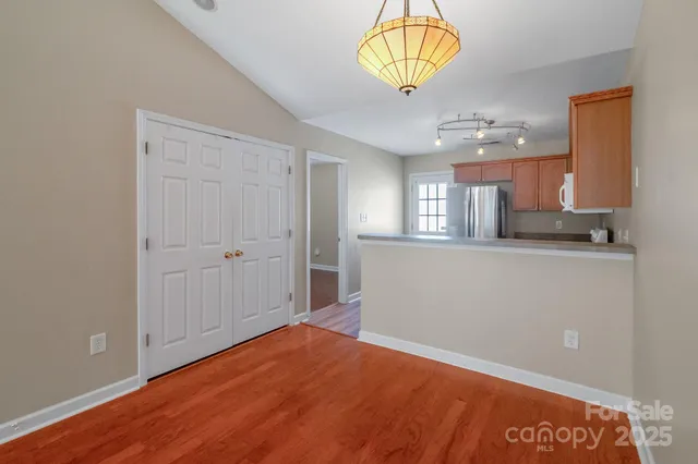 a view of a kitchen and a window
