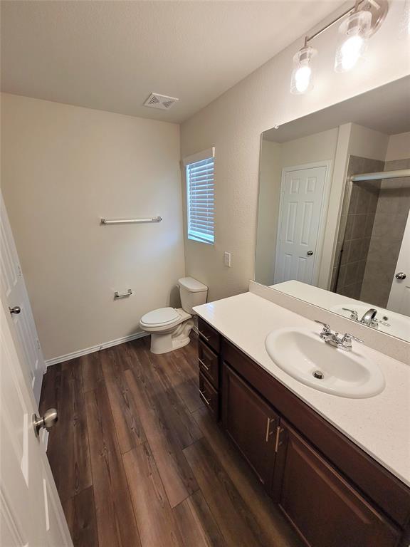 16029 Pemberly Lane Haslet, TX 76052 - Photo 8 of 19 a bathroom with a sink and a mirror