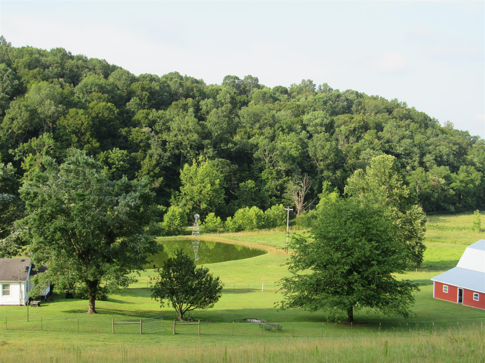 4580 Shannon Creek Road Goodspring, TN 38460 - Photo 2 of 25 a view of a grassy field with trees